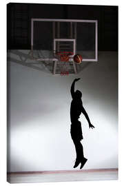 Leinwandbild  Silhouette eines Basketballers